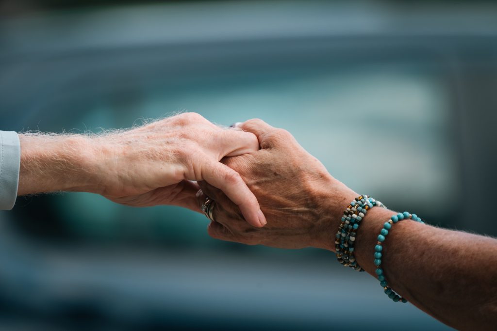 Caring hands representing resident support